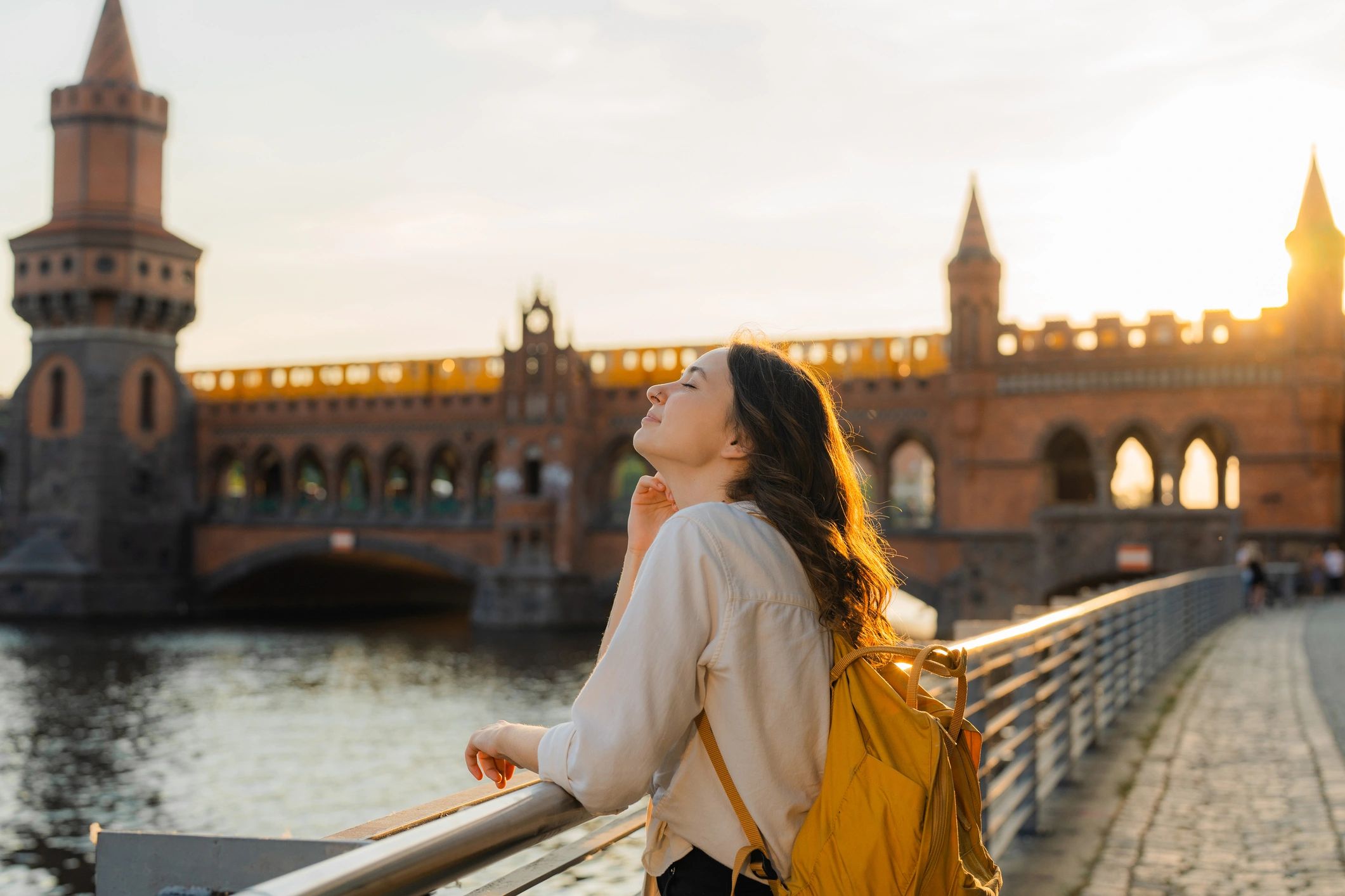 Traveller exploring a European city at sunset