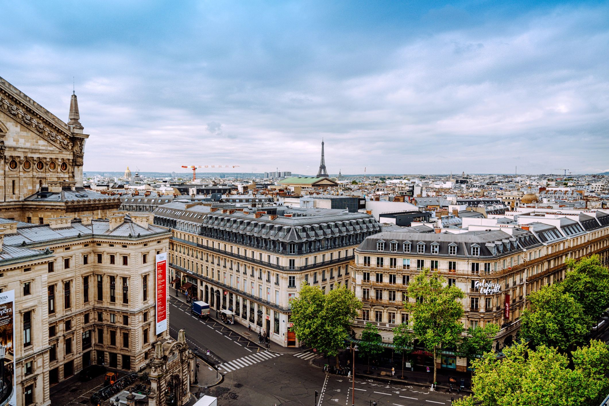 Paris rooftops with the Eiffel Tower in the distance